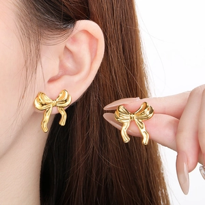 Élégantes boucles d'oreilles nœud dorées pour femmes en acier inoxydable poli de qualité