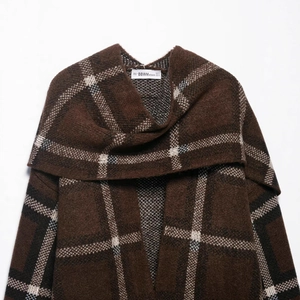 Plaid knitted cardigan jacket in brown and cream white pattern for autumn winter