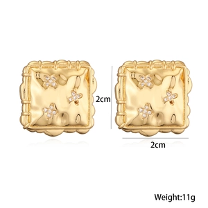 Detail of 18K gold plated square earrings featuring zircon cross pattern and weight data