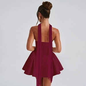 Detail of burgundy backless satin mini dress with elegant hanging mesh streamers
