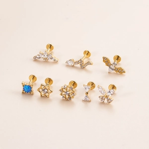 Set of 8 gold titanium labret studs featuring zircon butterfly snake and crown shapes