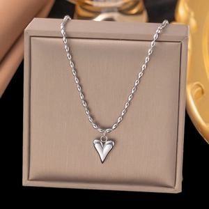 Elegant silver rice bead necklace with a minimalist 3D heart pendant in a luxury jewelry box