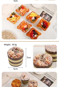 Macro shot of realistic PU foam cupcake models with frosting and fruit decoration detail