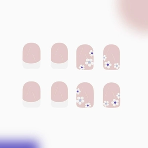Pink French nails with white tips and daisy flower patterns in a flat lay display
