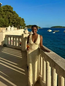 Elegant deep V-neck lace maxi dress in champagne beige for resort and evening wear