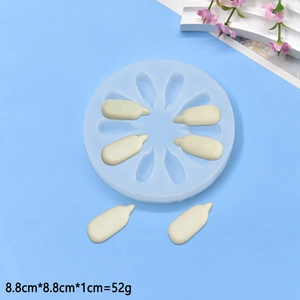 Macro detail of 8.8cm round silicone mold featuring sunflower seed shapes and texture