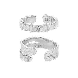 Textured S925 sterling silver adjustable couple rings with diamond accents on white background