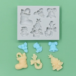 Christmas silicone mold set for DIY baking with snowman, tree and bell shapes