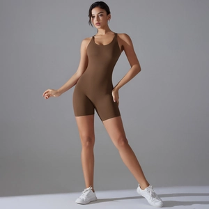 Macro detail of brown yoga bodysuit showing fine stitching and high-elastic matte fabric