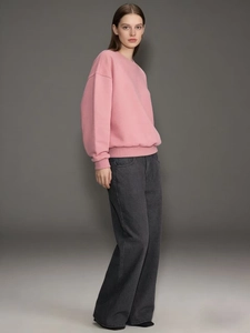 Detailed view of high-waist wide-leg jeans in charcoal gray with a relaxed vintage fit