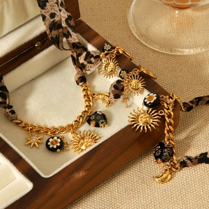 Vintage gold Cuban chain necklace with leopard print fabric and sun moon charms