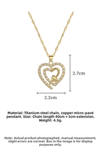 Detailed view of triple layered heart necklace with measurements 2.7x2.2cm in titanium steel
