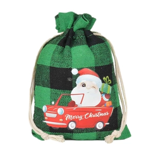 Christmas burlap drawstring bag with green plaid pattern and Santa in a red car