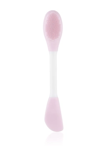 Close-up of double-headed silicone facial brush for cleansing and face mask application