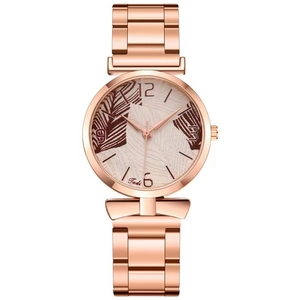 Detailed macro view of the rose gold steel strap and artistic pink patterned watch dial