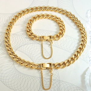 Golden chunky Cuban chain necklace and bracelet set with square clasp and safety chain