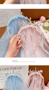 Detailed view of girls princess crown headband with sequined mesh veil in pink and blue