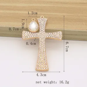 Golden rhinestone cross pendant and teardrop gem with detailed size measurements