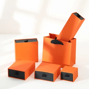 Luxury orange drawer jewelry gift boxes and matching carry bags in various sizes