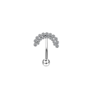 Macro detail of silver curved piercing jewelry with heart-shaped pave-set zircons