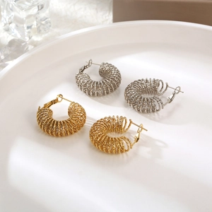 Retro titanium steel hollow spring C-shaped hoop earrings in gold and silver finish