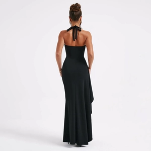 Elegant black backless halter maxi dress with neck ties and high waist floor-length skirt