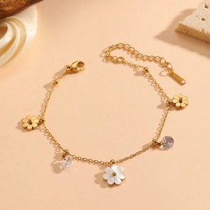 Elegant gold titanium steel daisy bracelet with shell flower charms and zircon stones