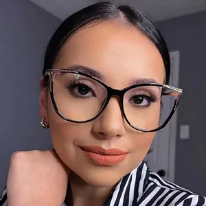 Fashionable black TR90 cat-eye anti-blue light glasses with gold metal accents on female model