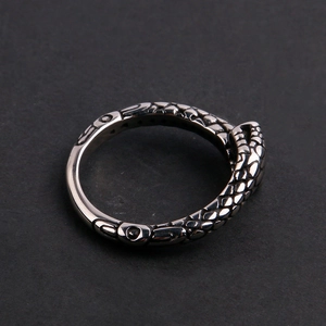 Vintage silver snake ring for men featuring detailed scales and a retro finish
