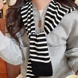 Chic black and white striped knitted shawl scarf for women on causal grey hoodie