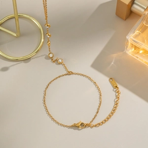 Bracelet en acier inoxydable plaqué or 18K avec pendentifs en zircon et poinçon S.STEEL