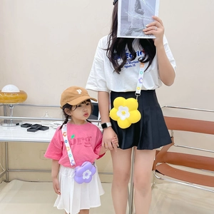 Matching set of yellow and lilac floral silicone crossbody bags for moms and children