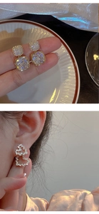 Primer plano detallado y vista de modelo de pendientes de corazón y cristal cuadrado