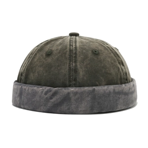 Retro washed cotton docker cap in dark green distressed finish with seamless crown