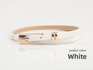 Detail of white slim leather belt featuring a modern gold-tone alloy buckle for dresses
