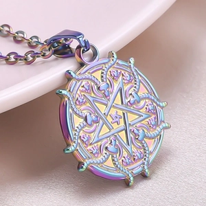 Macro shot of iridescent goat head pentagram pendant with 18k gold gradient plating