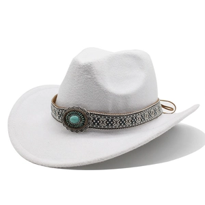 Close-up of white wool felt cowboy hat with ethnic embroidery and turquoise stone detail