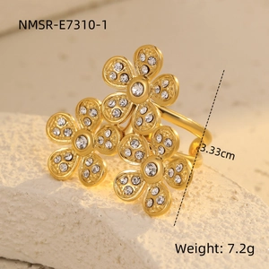 Detailed size view of a gold flower ring with crystals measuring 3.33cm in length