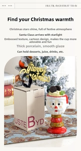Close-up of Santa Claus ceramic mug with 3D embossed texture and festive gift box