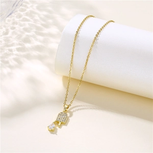 Gold stainless steel popsicle necklace with zircon inlay and a pear-shaped diamond pendant