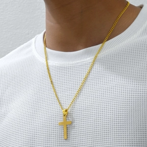 Modern gold titanium cross pendant necklace for men with stylish Cuban link chain design