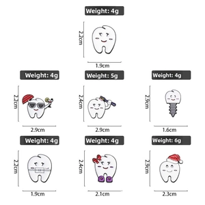 Detail showing weight and dimensions for seven cartoon tooth enamel pins and badges