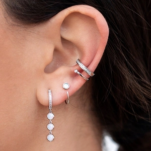 Elegant S925 silver needle drop earrings set with white opal stones and sparkling ear cuffs