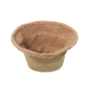 Detail of brown suede bucket hat featuring soft lamb wool lining for winter warmth