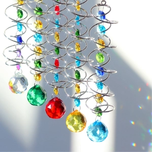 3D spinning metal wind chime with colorful crystal balls and rainbow light refraction