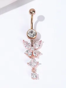 Detailed macro shot of rose gold butterfly belly ring featuring AAA cubic zirconia stones