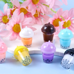 Creative miniature pearl milk tea cup keychains in seven vibrant assorted colors