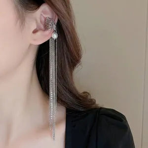 Silver lava texture ear cuff with long tassel chains, pearl and sparkling rhinestones