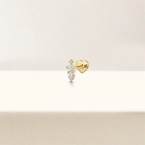 Detailed view of S925 silver gold-plated heart-back earring with marquise crystal