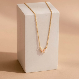 Elegant gold butterfly necklace with opal stone wings and sparkling zircon accents